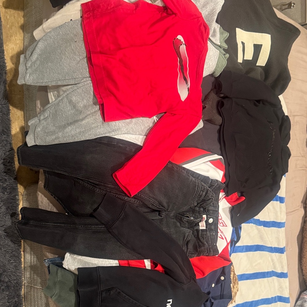 Boys size 7 shirts pants sweats and hoodies.